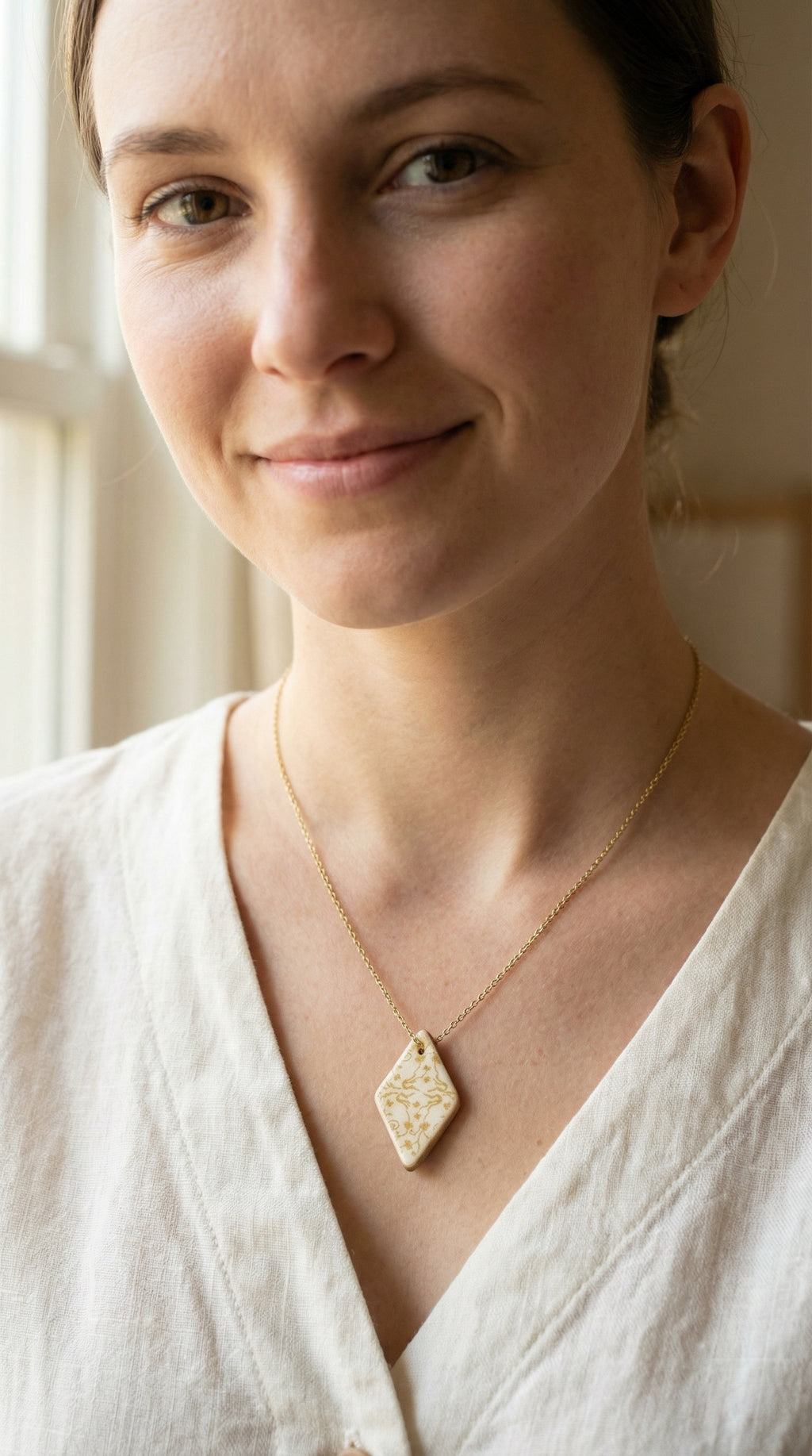 Golden Whisper Pendant