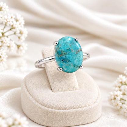 Desert Sky Ring oval turquoise-style stone sterling silver, on ring stand