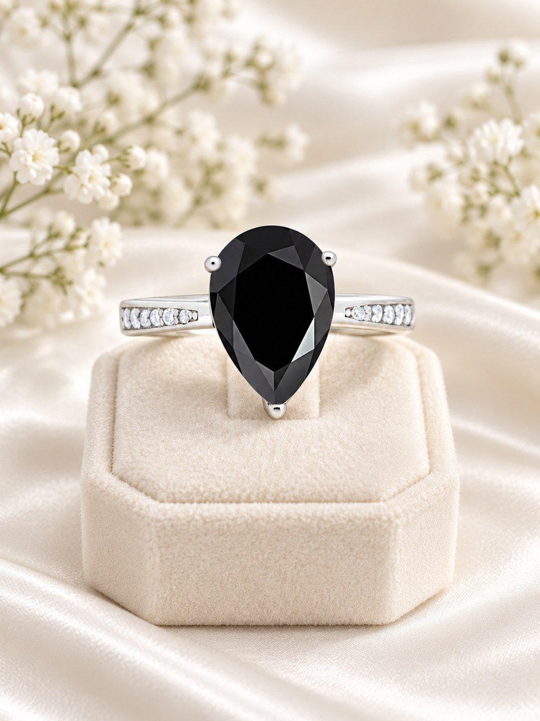 Midnight Teardrop Ring worn on the hand