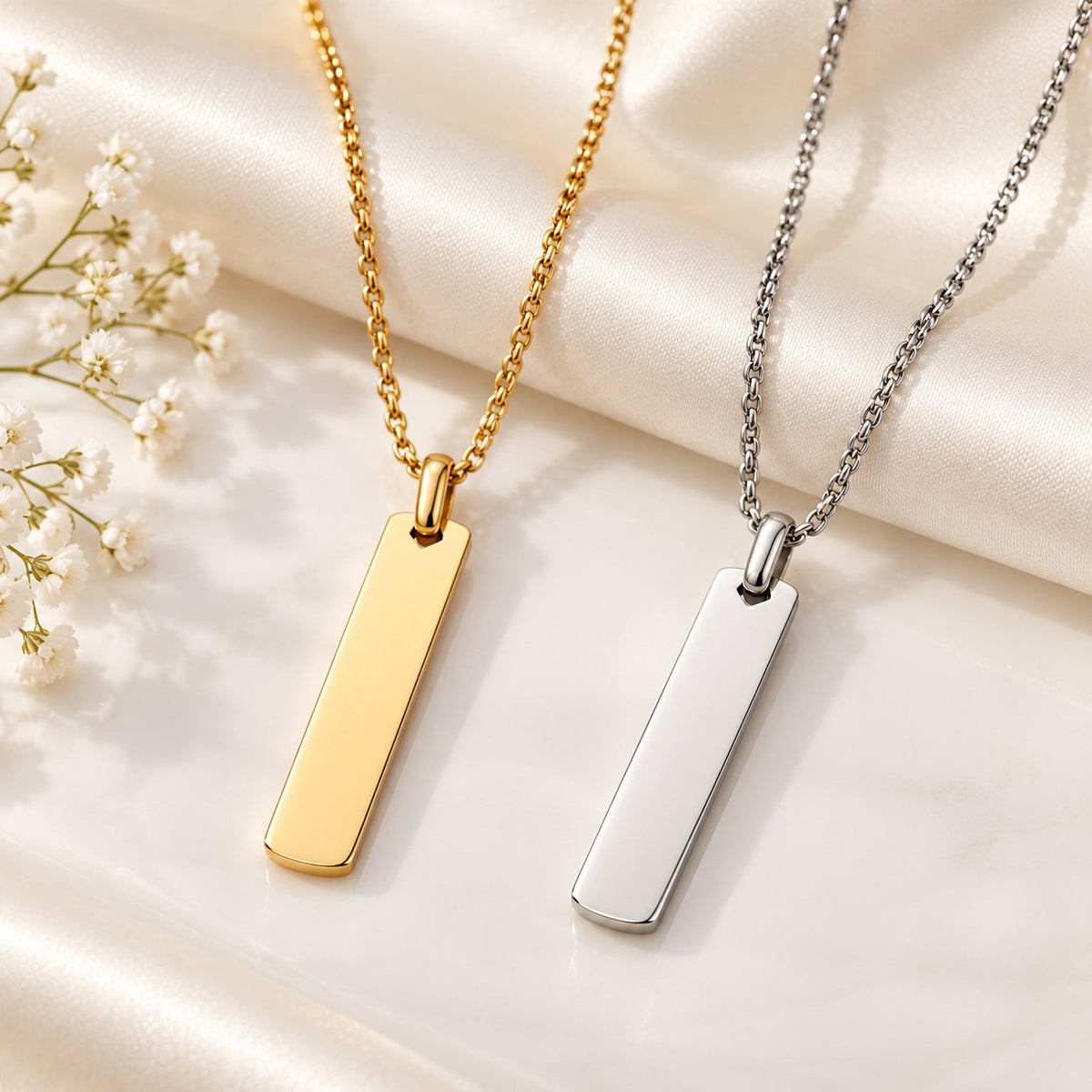 Engraved vertical bar necklace in silver and gold